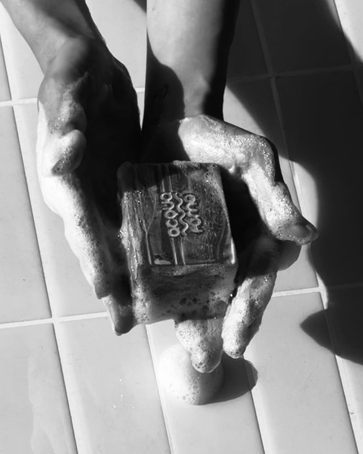 Olive oil and aloe vera soap bar styled with greenery, handmade in Italy