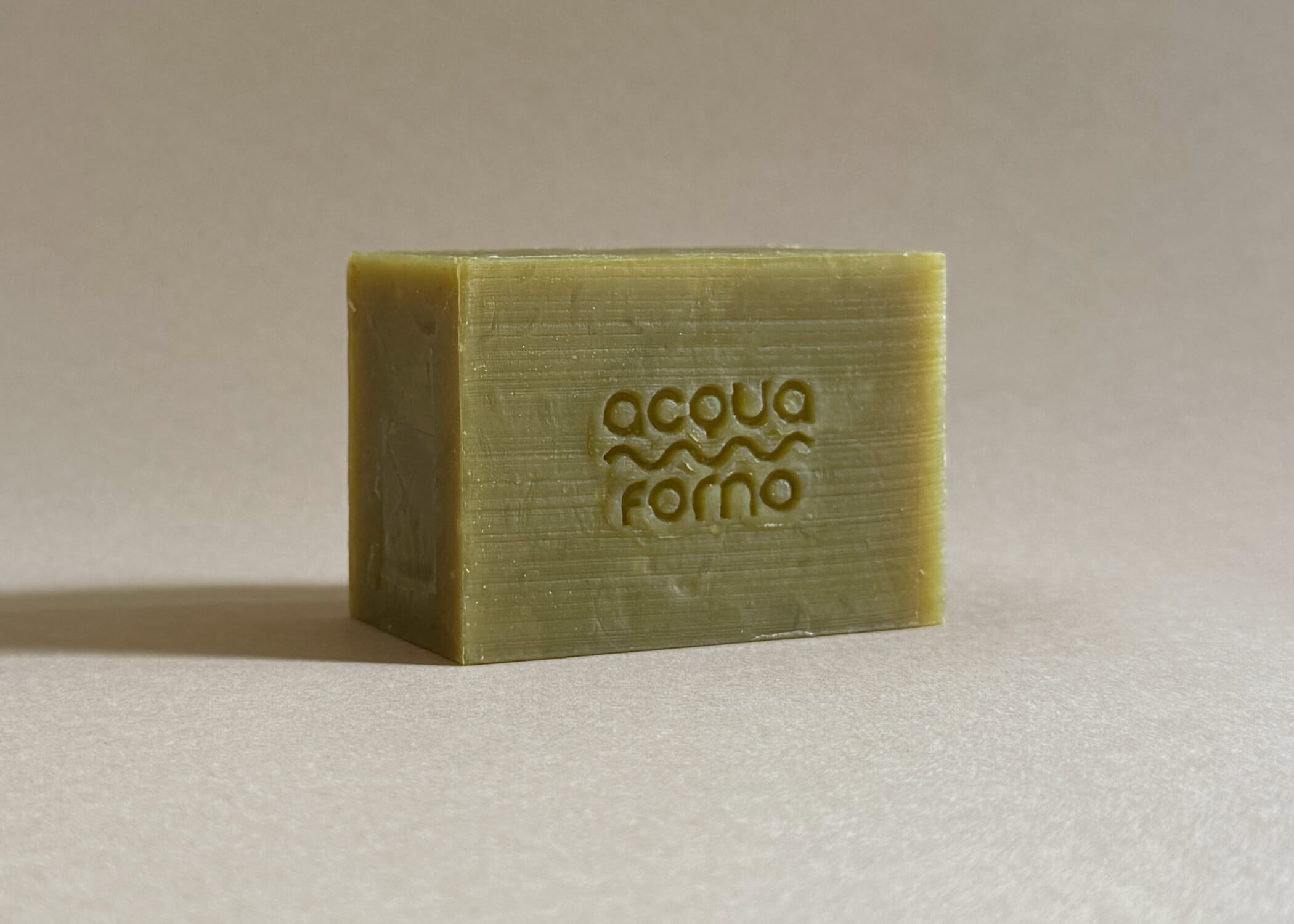 Close-up of green cold process soap made with olive oil and aloe vera, hydrating and soothing